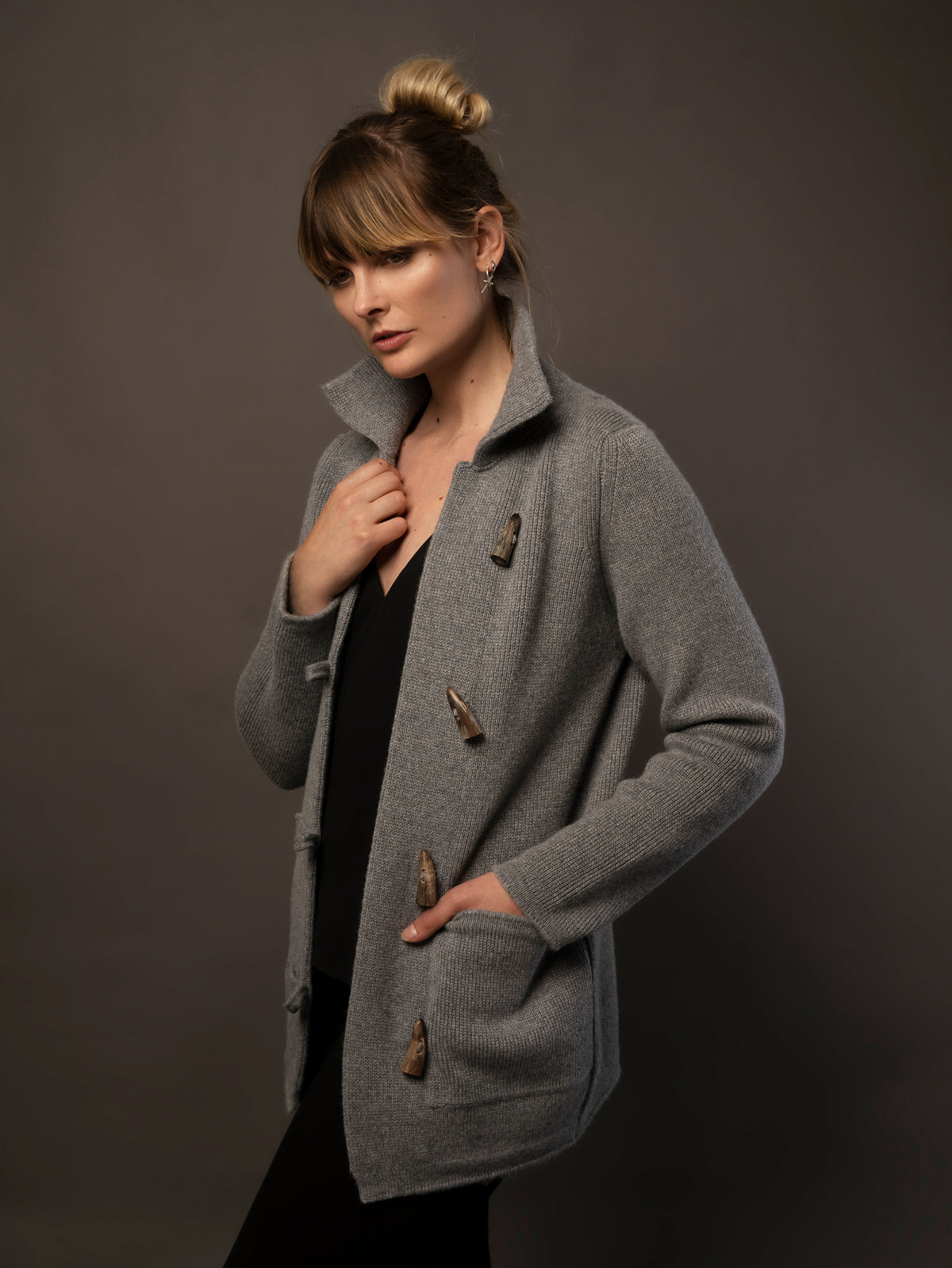 Ladies Cashmere Duffle Coat in Dark Grey. 100% cashmere handmade under the Royal Warrant in the UK. This is Cashmere at it&#39;s finest. 